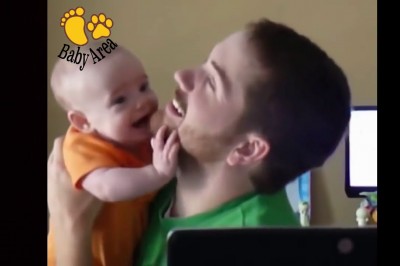 Baby loves Dad's Beard